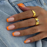 Lianfudai 24Pcs Simple Orange False Nails Short Coffin with French Design Wearable Fake Nails Frosted Full Cover Press on Nails Tips Art