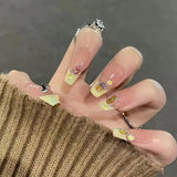 Lianfudai current nail trends 2023  24Pcs Long Ballerina Fake Nails Full Cover Nail Tips Yellow French False Nails with Aurora Rhinestone Press on Nails Wearable