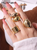 Lianfudai  NEW Exaggeration Punk Water Droplets Distortion Irregular Wide Version Gold Color Ring For Women Party Jewelry