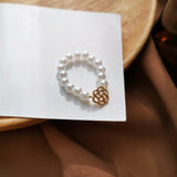 Lianfudai Christmas decor ideas Hollow Flower Pearl Beaded Elastic Lady Ring Fashion Metal Flower Lady Adjustable Ring New Jewelry Gift