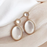 Lianfudai Christmas gifts ideas Korea New White Moonlight Cat's Eye Stone Earrings For Women Small Fresh Geometric Eardrop Elegant Ladies Temperament Jewelry